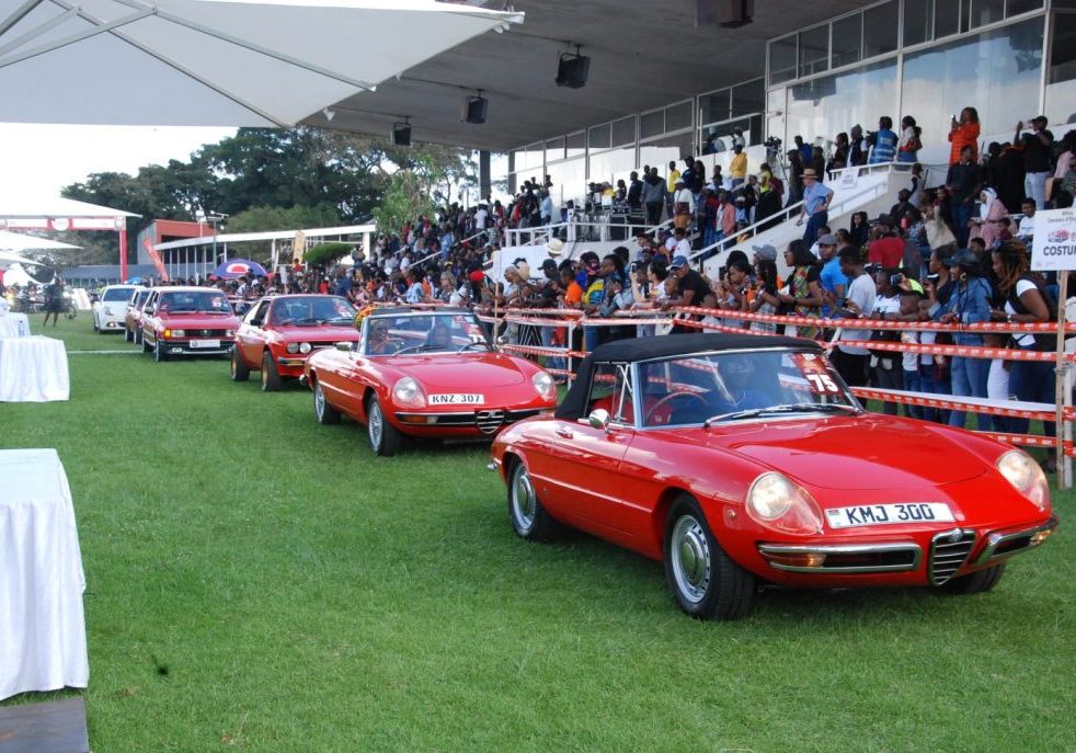 Alfas Spectators cheer the Alfa Romeo cars during the grand parade at the last Concours d'Elegance. Seven rare Alfa Romeos will be on show during this year's event to be held on September 29th at the Nairobi Racecourse.